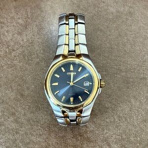 Citizen Eco-Drive Gold and Silver Watch with Dark Blue Face-